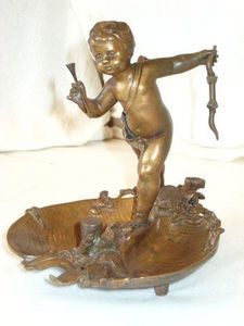 AUX MAINS DE BRONZE - cupidon en bronze - Vide Poche